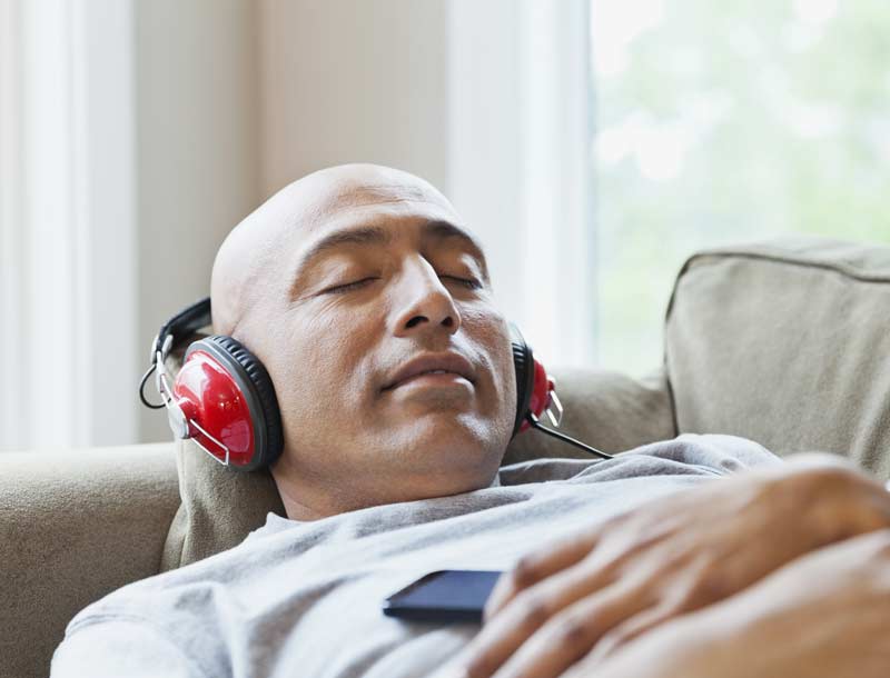 Man relaxing on couch