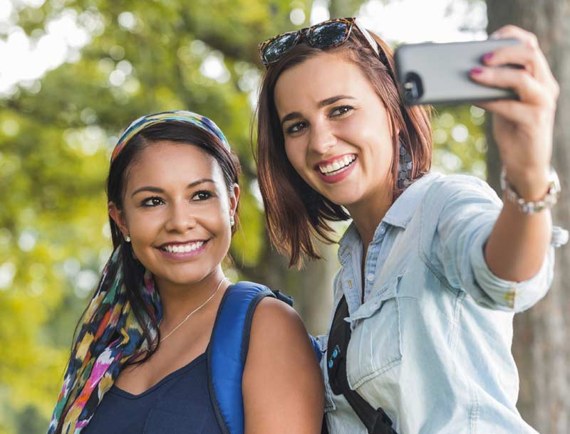 Two women smiling